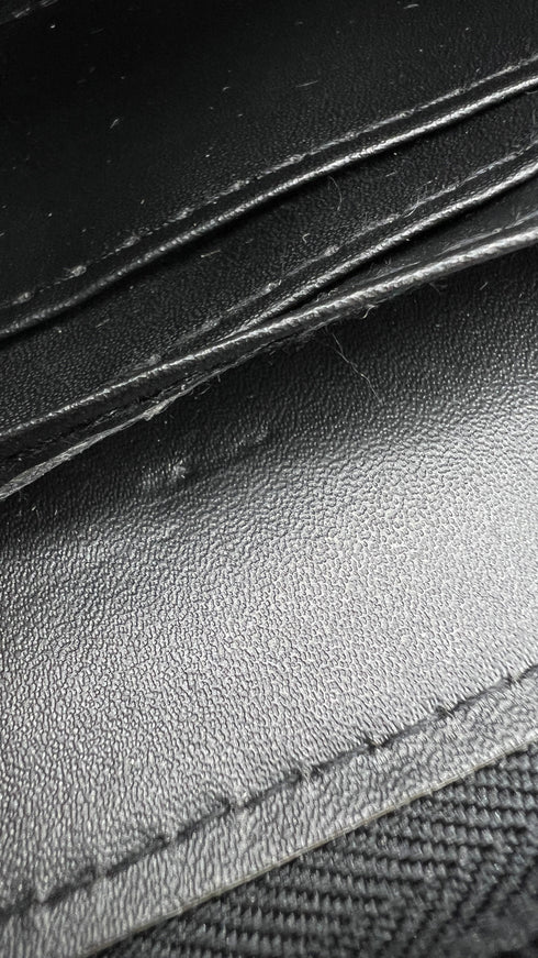 Portafoglio in pelle lavorata