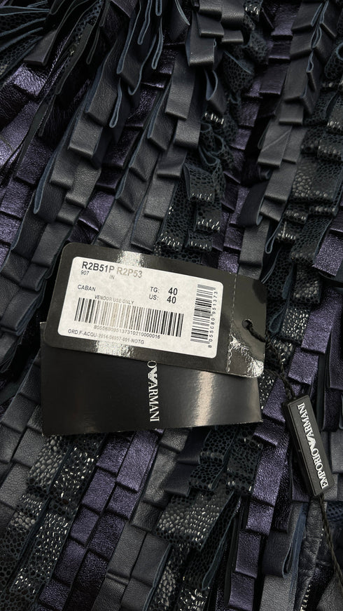 Bolero in pelle con cartellino