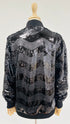 Bomber nero di paillettes con cartellino