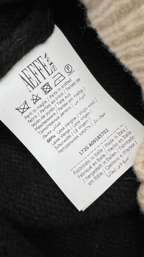 Polo maglia cartellino