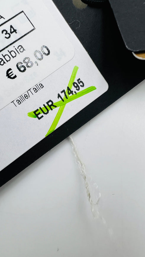 Gilet con cartellino