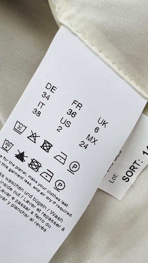 Gilet con cartellino