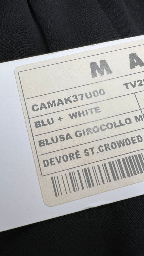 Maglia fantasia con cartellino