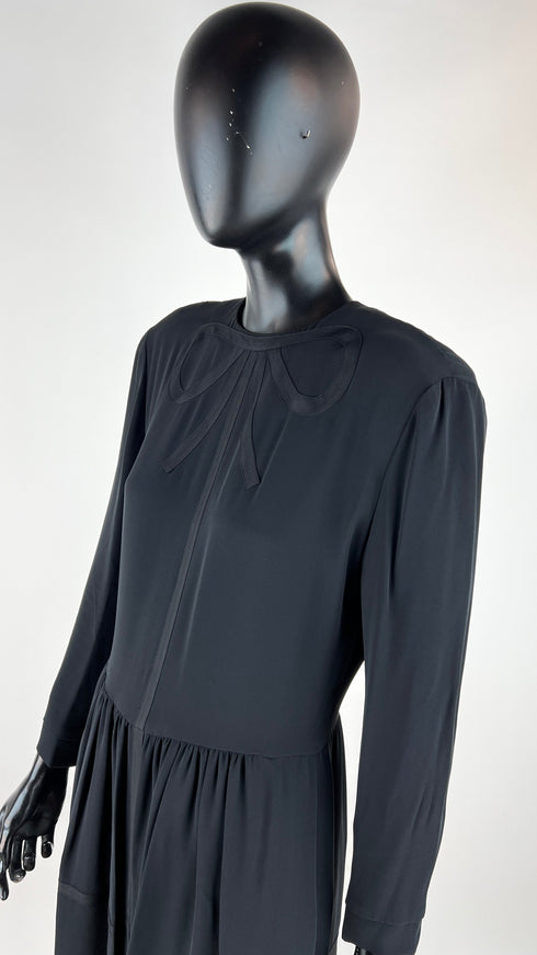 Abito lungo con fiocco