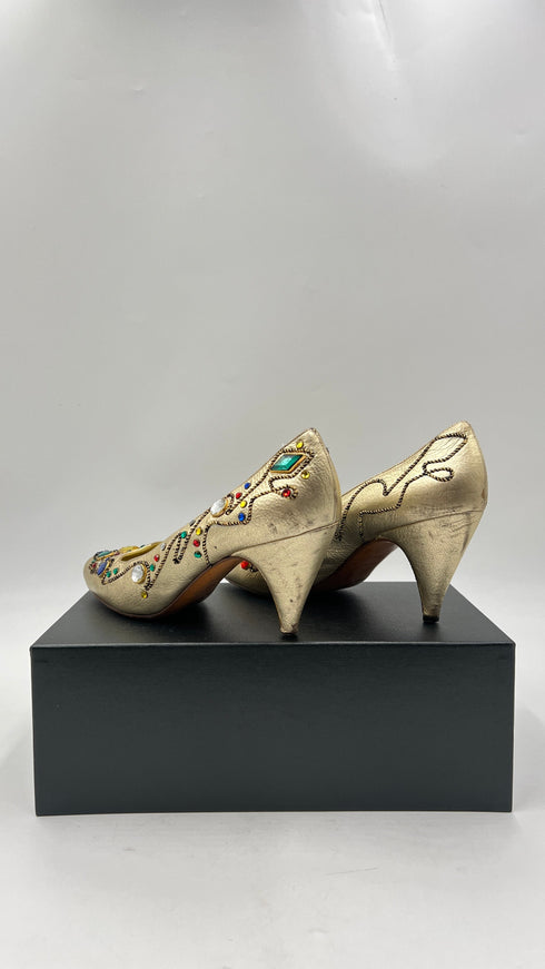 Décolleté dorate con appliqués