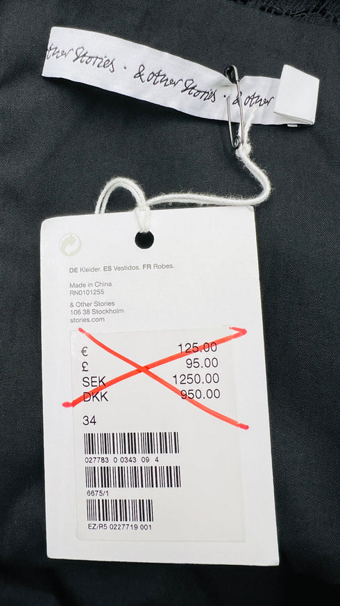 Abito corto in pizzo nero