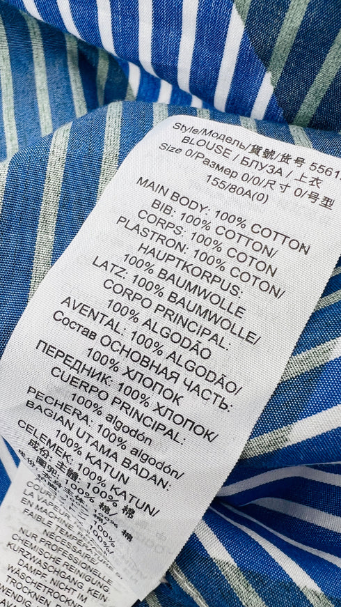 Blusa multi-righe con cartellino