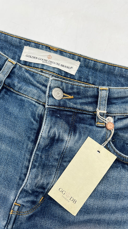 Jeans slim con cartellino