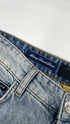 Jeans con fiamme