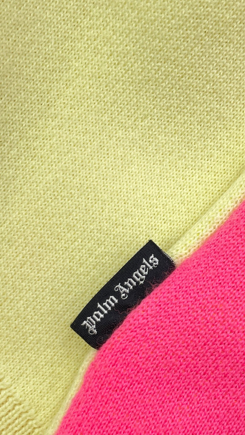 Maglione oversized con cartellino