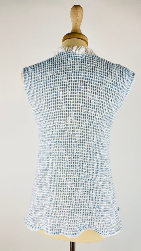 Top smanicato collo frange