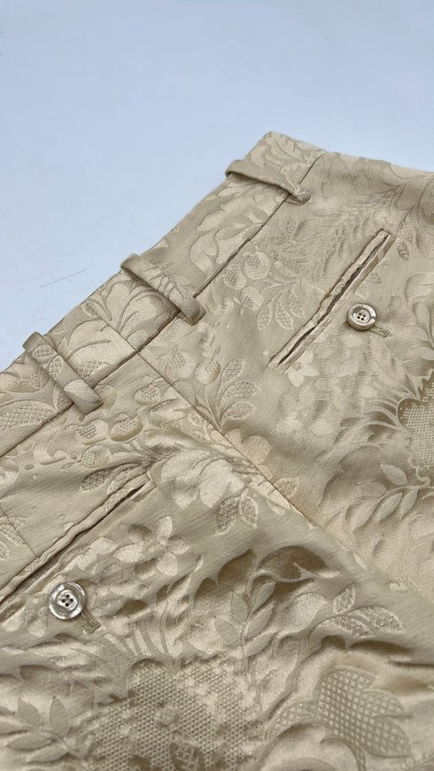 Pantaloni flared damascati con cartellino