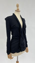 Maglia nera con rouche