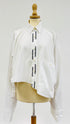 Camicia bianca asimmetrica