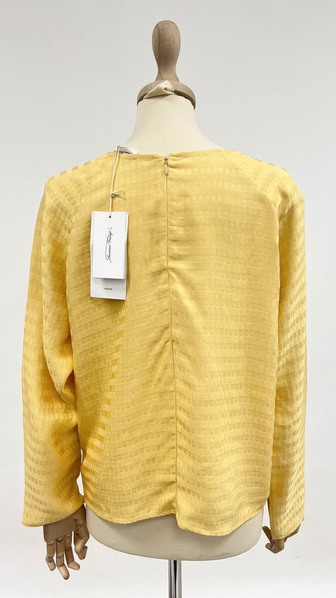 Blusa quadrati con cartellino