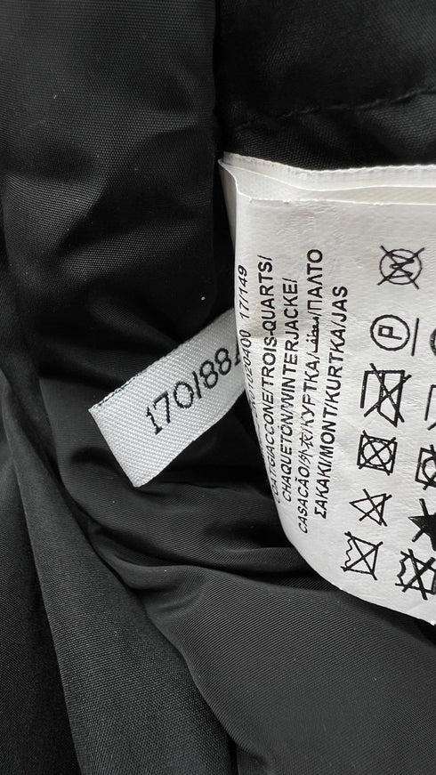 Piumino con cappuccio in pelliccia