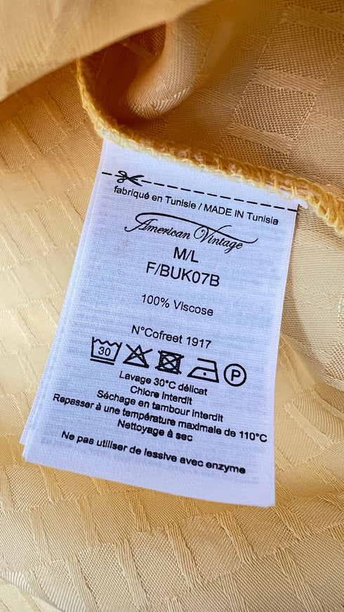 Blusa quadrati con cartellino