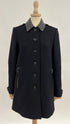 Cappotto pelle e borchie