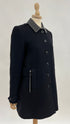 Cappotto pelle e borchie