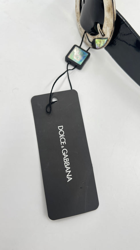 Cintura fibbia rotonda con cartellino