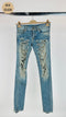 Jeans dettagli catene