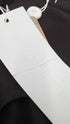 Tuta scollo cuore con cartellino