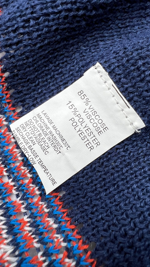 Cardigan sfrangiato con cartellino