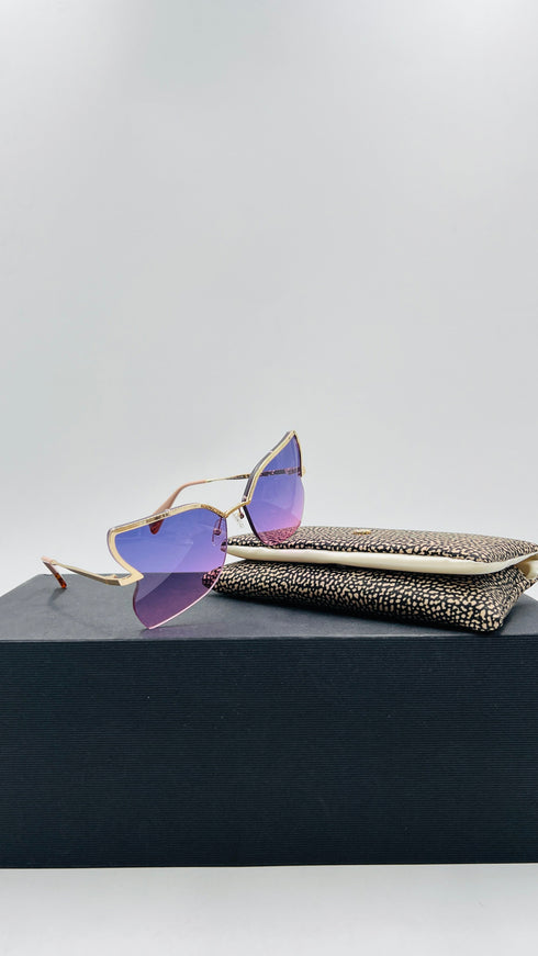 Occhiali da sole a farfalla