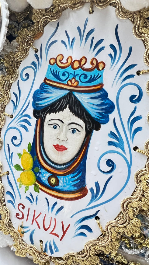 Borsa con passamanerie e perline