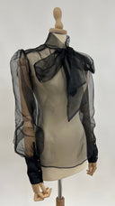 Blusa semitrasparente fiocco An