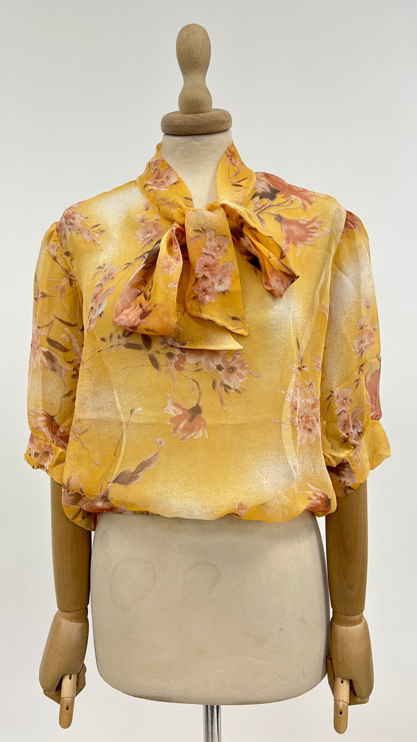 Blusa fiocco a fiori