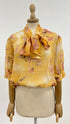 Blusa fiocco a fiori