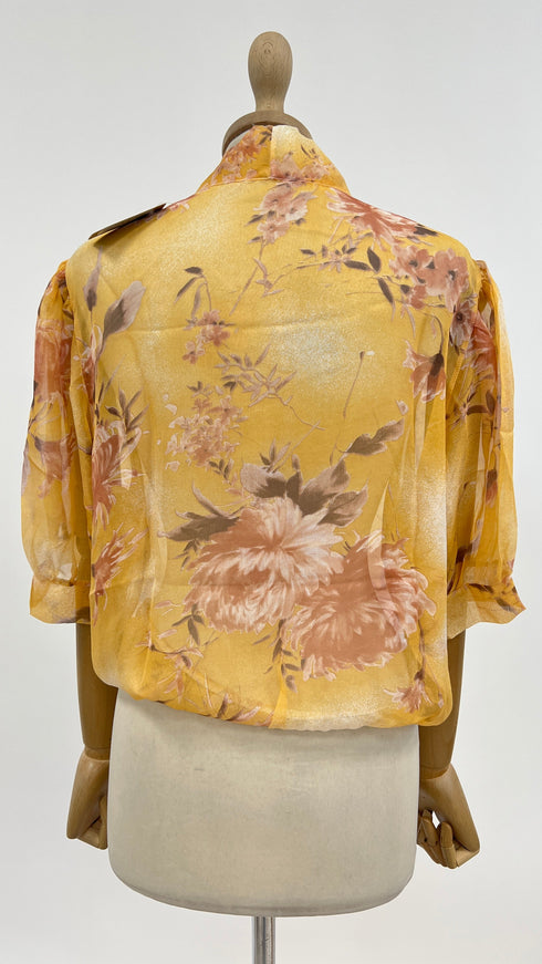 Blusa fiocco a fiori