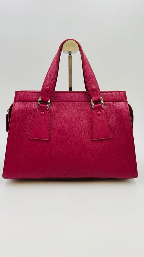 Borsa a mano rossa con cartellino