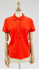 Polo in spugna arancione Tory Burch