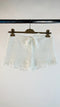 Shorts bianchi “Bernalda”