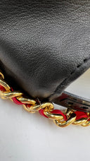Cappello con mini borsa Moschino