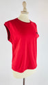 Top smanicato rosso