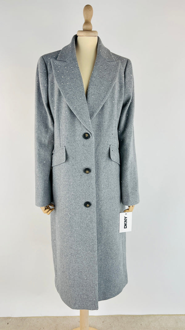 Cappotto con strass e cartellino