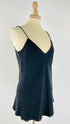 Top in seta a righe diagonali