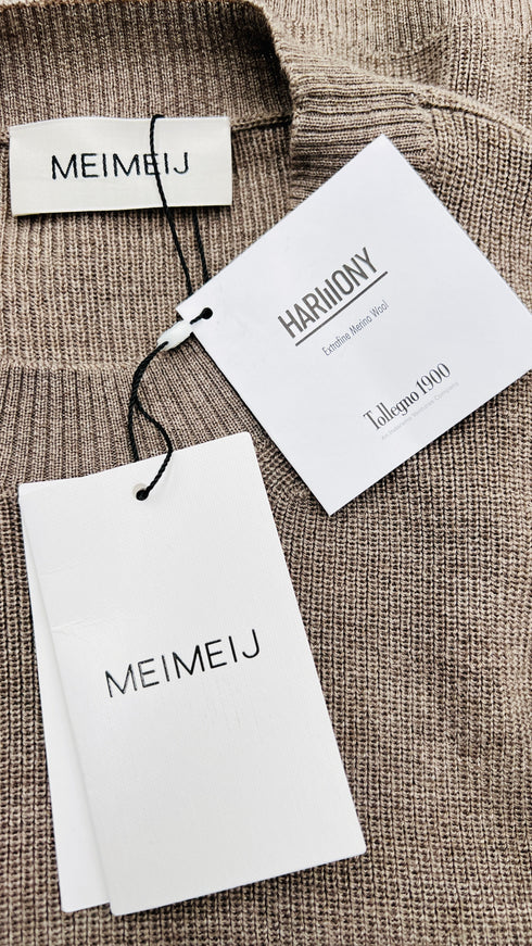 Maglia inserti in tessuto con cartellino