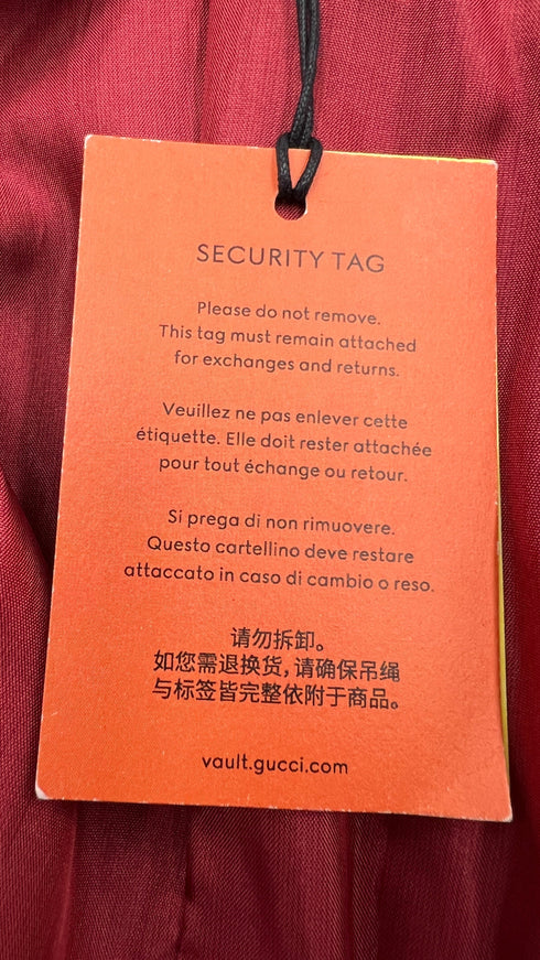 Abito in velluto con cartellino
