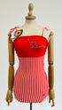 Costume a righe con cartellino