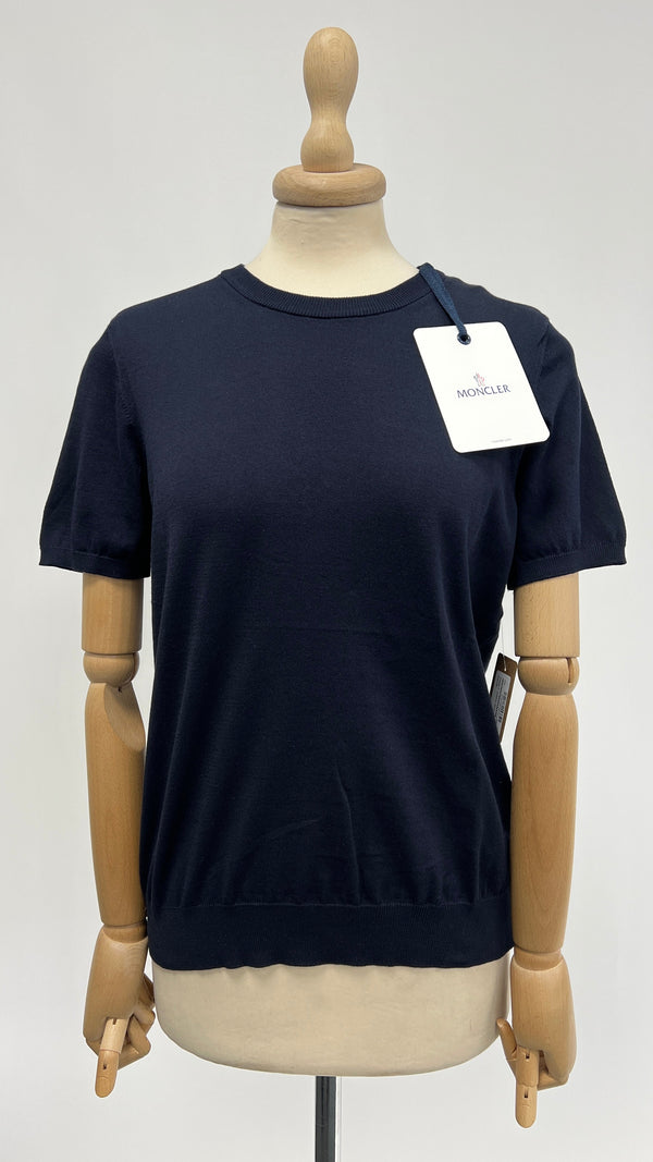 T-shirt blu con cartellino