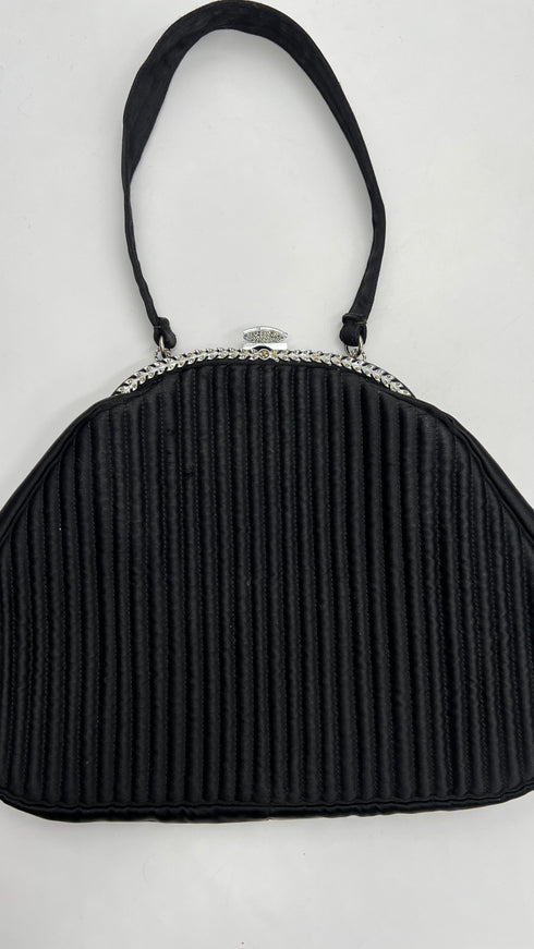 Borsa a mano trapuntata