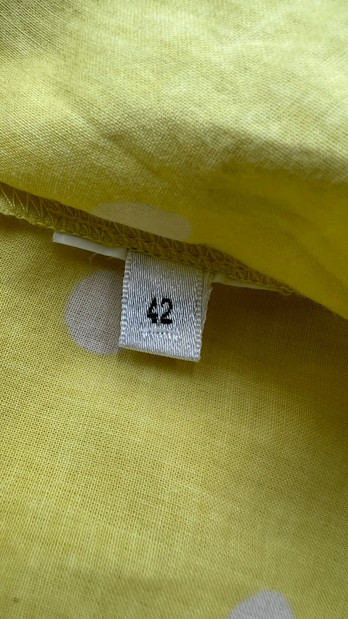 Camicia smanicata a pois