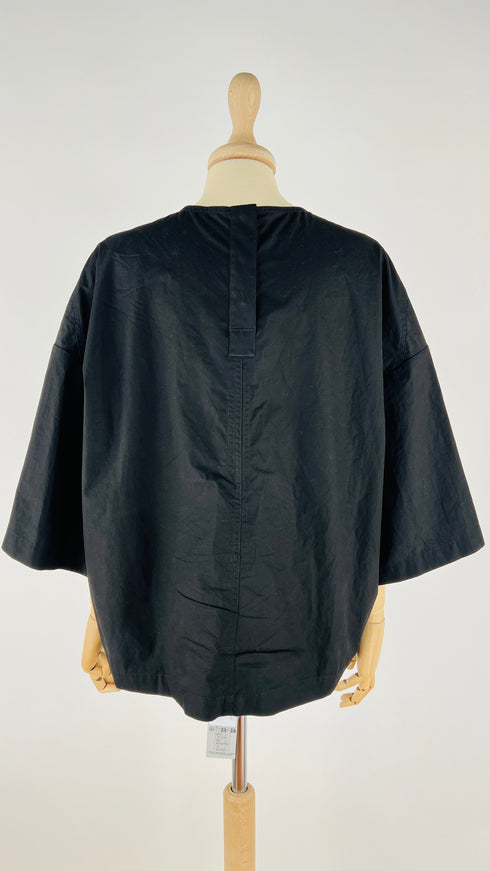 T-shirt over con cartellino