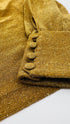 Maglia collo alto dorata