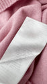 Maglione in lana rosa