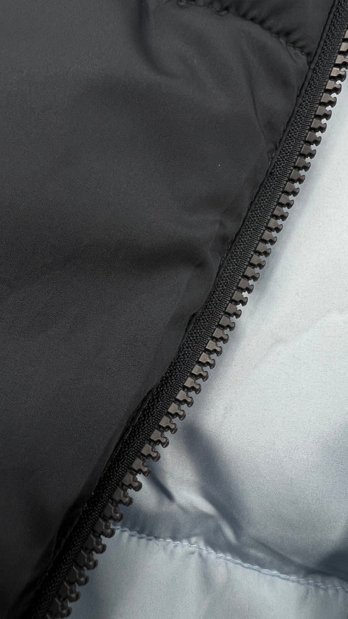 Gilet imbottito con cartellino